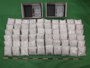 Hong Kong Customs seized about 60 kilograms of suspected ketamine with an estimated market value of about $35 million at Hong Kong International Airport on December 7. Photo shows the suspected ketamine seized and two of the network video recorders used to conceal the drugs.
