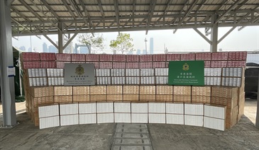 Hong Kong Customs on December 20 detected a suspected illicit cigarette smuggling case involving a barge in the waters near Yau Ma Tei Anchorage. About 36 million suspected illicit cigarettes with an estimated market value of about $100 million and a duty potential of about $69 million were seized. Photo shows some of the suspected illicit cigarettes seized.