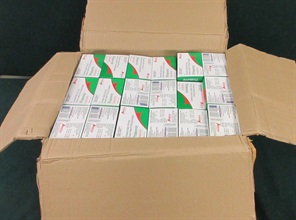 Hong Kong Customs detected four suspected medicine smuggling cases at Hong Kong International Airport on January 9 and yesterday (January 11). More than 12 000 tablets, about 4 388 milliliters and about 186 grams of suspected controlled medicines, with a total estimated market value of about $540,000, were seized. Photo shows the COVID-19 oral drugs seized by Customs officers from an air parcel arriving in Hong Kong from India.