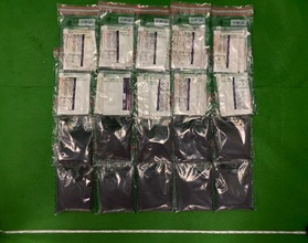 Hong Kong Customs seized about 9 kilograms of suspected methamphetamine and about 5 kilograms of suspected cocaine with a total estimated market value of about $12.2 million at the Kwai Chung Customhouse Cargo Examination Compound and Hong Kong International Airport respectively on May 20. Photo shows the suspected cocaine seized and the health food package bags used to conceal the dangerous drugs.