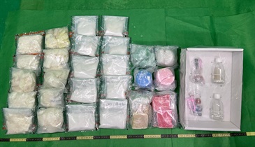 Hong Kong Customs seized about 6.2 kilograms of suspected methamphetamine with an estimated market value of about $3.5 million at Hong Kong International Airport on January 26. Photo shows the suspected methamphetamine seized, the candles mixed with the drugs and two suspected drug-inhaling apparatuses.