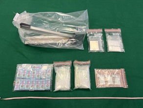 Hong Kong Customs on January 22 and yesterday (January 31) seized about 1.5 kilograms of suspected heroin and about 3kg of suspected methamphetamine, with a total estimated market value of about $3 million, at Hong Kong International Airport and in Kwun Tong respectively. Photo shows the suspected methamphetamine seized and a batch of suspected drug packaging paraphernalia.