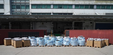 Hong Kong Customs on February 21 detected a suspected case of using an ocean-going vessel to smuggle goods to Malaysia at the Kwai Chung Container Terminals. A large batch of suspected smuggled goods, including electronic waste, vehicle parts and TV set-top boxes, with a total estimated market value of about $12 million was seized. Photo shows some of the suspected smuggled goods seized.