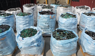 Hong Kong Customs on February 21 detected a suspected case of using an ocean-going vessel to smuggle goods to Malaysia at the Kwai Chung Container Terminals. A large batch of suspected smuggled goods, including electronic waste, vehicle parts and TV set-top boxes, with a total estimated market value of about $12 million was seized. Photo shows some of the suspected smuggled electronic waste seized.