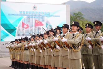 Hong Kong Customs held a passing-out parade for the 133rd-135th Customs Inspector Induction Courses and the 483rd-487th Customs Officer Induction Courses at the Hong Kong Customs College today (March 24). Photo shows members of the Customs and Excise Department Guards of Honour performing an exhibition drill.