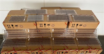 Hong Kong Customs yesterday (April 13) mounted an anti-smuggling operation at the Lok Ma Chau Control Point and detected a suspected smuggling case involving a cross-boundary container truck. About 200 000 suspected smuggled mobile phone parts with an estimated market value of about $6 million were seized. Photo shows some of the suspected smuggled mobile phone camera lens seized.