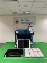 Hong Kong Customs detected two dangerous drugs cases at Shenzhen Bay Control Point and Hong Kong International Airport on March 2 and April 16 respectively and seized a total of about 46 kilograms of suspected methamphetamine with an estimated market value of about $29 million. Photo shows the suspected methamphetamine seized by Customs officers and a thermoforming machine used to conceal the drugs in the second case.