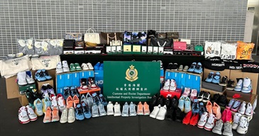Hong Kong Customs conducted a 19-day joint enforcement operation with Mainland and Macao Customs from April 24 to May 12 to combat cross-boundary counterfeiting activities in the three places and with goods destined for overseas countries. During the operation, Hong Kong Customs seized about 14 000 items of suspected counterfeit goods with an estimated market value of about $3.9 million. Photo shows some of the suspected counterfeit goods seized.