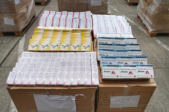 Hong Kong Customs mounted a special enforcement operation codenamed "Clear Sky" from mid-April to mid-May and detected a smuggling case involving a river trade vessel and two smuggling cases involving ocean-going vessels. A large batch of suspected smuggled goods, including suspected scheduled dried shark fins, suspected controlled medicines and used electronic products, with a total estimated market value of about $200 million was seized. Photo shows some of the suspected controlled medicines seized.