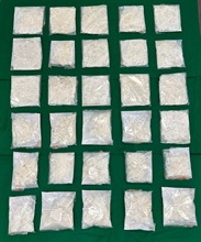 Hong Kong Customs detected two dangerous drugs cases in Yuen Long and Tuen Mun on June 16 and yesterday (June 20) respectively and seized about 32 kilograms of suspected ketamine and about 3.5kg of suspected cannabis buds. The total estimated market value was about $14.7 million. Photo shows the suspected ketamine seized by Customs officers in the first case.