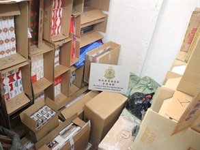 Hong Kong Customs has stepped up enforcement before the summer holidays and mounted a territory-wide operation codenamed "Thunder" in the past three weeks to combat illicit cigarette telephone-ordering activities in public rental housing. Over 1.6 million sticks of suspected illicit cigarettes with an estimated market value of about $6 million and a duty potential of about $4 million were seized. Photo shows some of the suspected illicit cigarettes seized by Customs officers from a suspected illicit cigarette storage centre.
