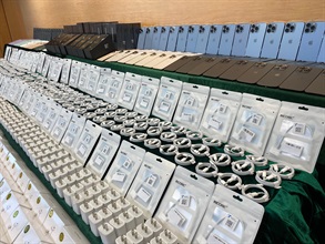 Hong Kong Customs conducted a three-week special enforcement operation from June 13 to yesterday (July 3) to combat counterfeit electronic goods activities involving cross-boundary transshipments and local deliveries. During the operation, Customs detected a total of 17 related cases and seized more than 26 000 items of suspected counterfeit electronic goods with an estimated market value of over $6.8 million. Photo shows some of the suspected counterfeit mobile phone accessories seized.
