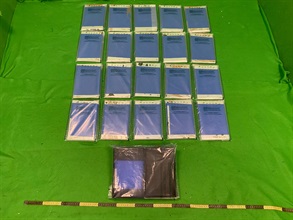 Hong Kong Customs on July 3 seized about 4 kilograms of suspected ketamine with an estimated market value of about $2.25 million. Photo shows the suspected ketamine seized and one of the paper boxes used to conceal the drugs.