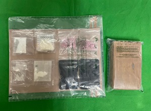 Hong Kong Customs today (July 31) seized about 1.2 kilograms of suspected cocaine, about 75g of suspected crack cocaine, about 25g of suspected cannabis buds and about 10g of suspected ketamine with a total estimated market value of about $1.4 million in Cheung Sha Wan. Photo shows the suspected dangerous drugs seized.