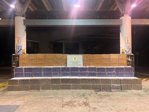 Hong Kong Customs on August 4 and 5 detected three smuggling cases of tobacco products in Kwai Chung and Tuen Mun, and seized about 11 million suspected illicit cigarettes and about 1 400 kilograms of suspected duty-not-paid manufactured tobacco products in total. The total estimated market value was about $49 million, with a duty potential of about $32 million. Photo shows the suspected illicit cigarettes seized in the second case.