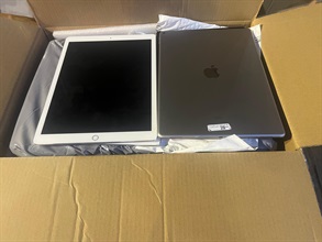 Hong Kong Customs on August 8 mounted an anti-smuggling operation in the vicinity of Tai O, Lantau Island, and detected a suspected smuggling case using a speedboat. A batch of suspected smuggled goods, including frozen Wagyu beef, dried shark fins and used tablet computers, with an estimated market value of about $18 million, was seized. Photo shows some of the suspected smuggled used tablet computers seized.