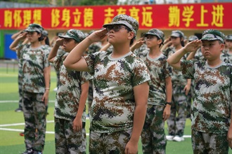 The Commissioner of Customs and Excise, Ms Louise Ho, today (August 13) officiated at the graduation ceremony of the Military Training Experience Camp for Hundred Youths organised by "Customs YES" in Shenzhen. Photo shows participants having military formation training to enhance physical and mental strength.