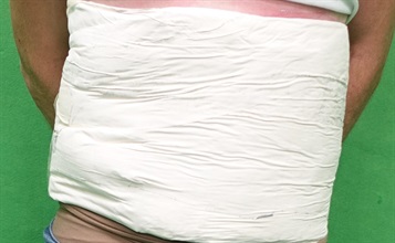 Hong Kong Customs on September 10 detected a passenger drug trafficking case at Hong Kong International Airport and seized about 3 kilograms of suspected cocaine with an estimated market value of about $2.4 million. Photo shows the suspected cocaine strapped around a male passenger’s waist, as found by Customs officers when conducting customs clearance.