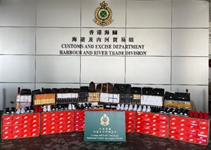 Hong Kong Customs seized about 22 000 items of suspected counterfeit goods with an estimated market value of about $2.7 million at the Tuen Mun River Trade Terminal on April 13. Photo shows some of the suspected counterfeit goods seized.