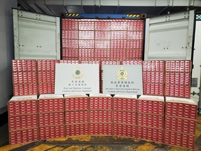 Hong Kong Customs yesterday (October 12) detected a large-scale illicit cigarette smuggling case and seized about eight million suspected illicit cigarettes at the Kwai Chung Customhouse Cargo Examination Compound. The estimated market value was about $30 million with a duty potential of about $20 million. Photo shows the suspected illicit cigarettes seized.