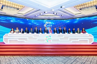 The Secretary for Commerce and Economic Development, Mr Algernon Yau (eighth left); the Commissioner of Customs and Excise, Ms Louise Ho (eighth right); and other guests today (November 30) officiate at the opening ceremony of the AEO Symposium for ASEAN and Hong Kong, China.