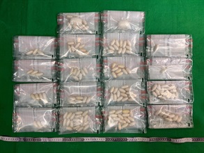 Hong Kong Customs on December 3 detected a dangerous drugs internal concealment case involving two incoming passengers at Hong Kong International Airport and seized about 1.8 kilograms of suspected cocaine with an estimated market value of about $2 million. Photo shows the suspected cocaine seized.