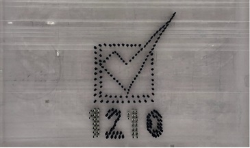 Hong Kong Customs Passing-out Parade was held today (December 8). Photo shows the parade forming a pattern that represents the District Council election.