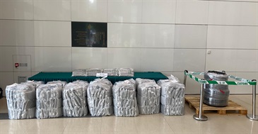 Hong Kong Customs on November 21 detected a large-scale seaborne drug trafficking case, and seized about 228 kilograms of suspected cannabis buds with an estimated market value of about $52 million at the Kwai Chung Customhouse Cargo Examination Compound. Photo shows the suspected cannabis buds seized and one of the tyres used to conceal the drugs.