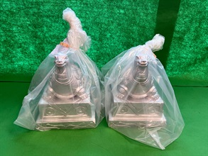 Hong Kong Customs on December 20 seized about 47.1 kilograms of suspected heroin with an estimated market value of about $37 million at Hong Kong International Airport. Photo shows the suspected heroin which was molded into two ornaments.