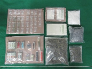Hong Kong Customs yesterday (January 25) seized about 3.6 kilograms of suspected cocaine, about 600 grams of suspected cannabis buds, about 80g of suspected crack cocaine and a small amount of suspected cannabis oil, with a total estimated market value of about $3.8 million, in Mong Kok, Yuen Long and Kwun Tong. Photo shows the suspected drugs seized.