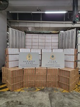 Hong Kong Customs mounted a territory-wide large-scale special operation codenamed "Tempest" since February 19 to step up enforcement in combating illicit cigarette activities on all fronts at each control point and all districts across the territory in Hong Kong. As of March 14, including the figures of the first phase, Customs detected a total of 1 361 related cases and seized about 61 million suspected illicit cigarettes, about 8 340 grams of cigars, and about 540g of manufactured tobacco products, with a total estimated market value of about $270 million and a duty potential of about $190 million. Photo shows the suspected illicit cigarettes seized from a 40-foot container which was declared as carrying frozen food.