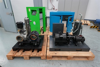 Hong Kong Customs on March 27 detected a suspected case of large-scale gold smuggling involving air freight, and seized about 146 kilograms of suspected gold with an estimated market value of about $84 million, at Hong Kong International Airport. Photo shows two air compressors used to conceal the batch of suspected smuggled gold.