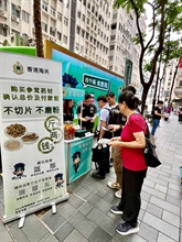 Hong Kong Customs has launched a special operation since April 27 to step up patrols during the Labour Day Golden Week of the Mainland at popular shopping spots in various districts and to remind traders to comply with the requirements of the Trade Descriptions Ordinance, with a view to safeguarding and promoting rights of local consumers and visitors. Photo shows Customs officers distributing pamphlets in Causeway Bay.