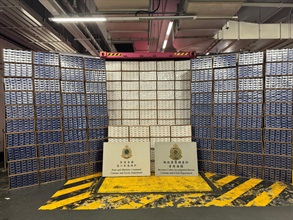 Hong Kong Customs detected three illicit cigarette smuggling cases involving seaborne containers on July 11, July 17 and August 7 in Kwai Chung. A total of about 28.5 million suspected illicit cigarettes with an estimated market value of about $128 million and a duty potential of about $94 million were seized. Photo shows the suspected illicit cigarettes seized on July 11.