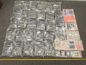 Hong Kong Customs detected three dangerous drugs cases in Tsuen Wan, Yuen Long; Yau Tong; and Hong Kong International Airport yesterday (December 10). Photo shows suspected cannabis buds, gummy candies containing suspected tetrahydro-cannabinol (THC) and vape sticks containing suspected THC seized in the first case.