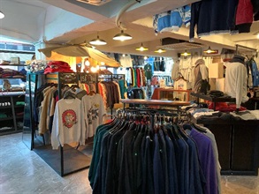 Hong Kong Customs seized a total of about 9 300 items of suspected counterfeit vintage clothes and 40 suspected counterfeit handbags with an estimated market value of about $5.3 million at Lok Ma Chau Control Point, Tsuen Wan and Mong Kok on March 12 and 16. This is the first case involving counterfeit vintage clothes detected by Customs. Photo shows the retail shop in Mong Kok of a vintage clothes company connected with the case.