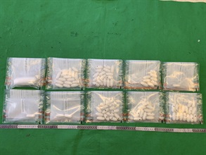 Hong Kong Customs on February 8 detected one dangerous drugs internal concealment case involving two incoming passengers at Hong Kong International Airport and seized a total of about 890 grams of suspected cocaine with an estimated market value of about $720,000. Photo shows the suspected cocaine seized.