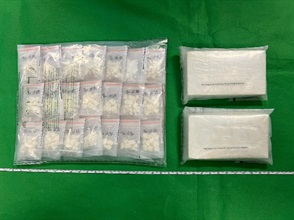 Hong Kong Customs yesterday (February 11) seized about 2 kilograms of suspected cocaine and about 400 grams of suspected crack cocaine, with a total estimated market value was about $2.1 million, in Sham Tseng. Photo shows the suspected cocaine and the suspected crack cocaine seized.