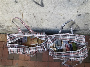 Hong Kong Customs today (February 17) conducted an anti-illicit cigarette operation in Sham Shui Po to fight against criminals distributing illicit cigarettes in the district. About 5 500 suspected illicit cigarettes, with an estimated market value of about $24,000 and a duty potential of about $18,000, were seized. Photo shows some of the illicit cigarettes seized.