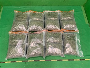 Hong Kong Customs yesterday (March 2) detected a drug trafficking case involving baggage concealment at Hong Kong International Airport and seized about 16 kilograms of suspected cannabis buds with an estimated market value of about $4.1 million, as well as a suspected alternative smoking product. Photo shows the suspected cannabis buds seized.