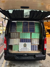 Hong Kong Customs yesterday (March 5) raided suspected illicit cigarette mobile storage centres in Yuen Long and seized about 1.03 million suspected illicit cigarettes with an estimated market value of about $4.6 million and a duty potential of about $3.4 million. Among them, about 1.02 million of the seized illicit cigarettes were "cheap whites", accounting for about 99 per cent of the total seizure. Photo shows one of the vehicles suspected to be used for storing and distributing illicit cigarettes.
