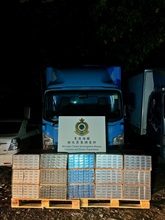 Hong Kong Customs yesterday (March 5) raided suspected illicit cigarette mobile storage centres in Yuen Long and seized about 1.03 million suspected illicit cigarettes with an estimated market value of about $4.6 million and a duty potential of about $3.4 million. Among them, about 1.02 million of the seized illicit cigarettes were "cheap whites", accounting for about 99 per cent of the total seizure. Photo shows one of the vehicles suspected to be used for storing and distributing illicit cigarettes.