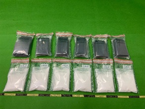 Hong Kong Customs seized about 3 kilograms of suspected ketamine with an estimated market value of about $1.8 million at Hong Kong International Airport on March 9. One man was subsequently arrested today (March 12). Photo shows the suspected ketamine seized and the cardboard used to conceal the dangerous drugs.