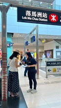 Hong Kong Customs has launched a special operation since April 24 to step up patrols during the Labour Day Golden Week of the Mainland at popular shopping spots in various districts and to remind traders to comply with the requirements of the Trade Descriptions Ordinance, with a view to safeguarding and promoting rights of local consumers and visitors. Photo shows a Customs officer distributing pamphlets at the Lok Ma Chau Control Point.