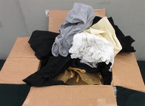 Hong Kong Customs on March 3 seized about 1.2 kilograms of suspected scheduled dried totoaba fish maws with an estimated market value of about $260,000 at Hong Kong International Airport. Photo shows the batch of suspected scheduled dried totoaba fish maws wrapped with clothes.