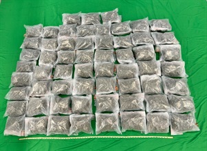 Hong Kong Customs yesterday (May 25) detected a drug trafficking case involving baggage concealment at Hong Kong International Airport and seized about 32 kilograms of suspected cannabis buds with an estimated market value of about $6.9 million. Photo shows the suspected cannabis buds seized.