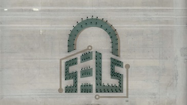 Hong Kong Customs Passing-out Parade was held today (June 5). Photo shows the parade forming the logo of the Single E-lock Scheme.