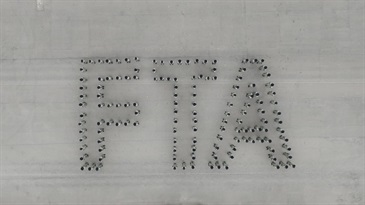 Hong Kong Customs Passing-out Parade was held today (June 5). Photo shows the parade forming the English abbreviation of the Free Trade Agreement Transhipment Facilitation Scheme.