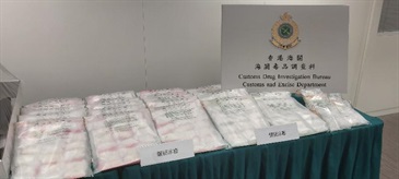 Hong Kong Customs seized about 51.5 kilograms of suspected methamphetamine with an estimated market value of about $32 million in Yuen Long on February 18. This is the first drug trafficking case detected by Customs involving a self-service container yard. Photo shows the suspected methamphetamine seized.
