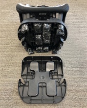 Hong Kong Customs seized about 51.5 kilograms of suspected methamphetamine with an estimated market value of about $32 million in Yuen Long on February 18. This is the first drug trafficking case detected by Customs involving a self-service container yard. Photo shows some of the suspected methamphetamine seized concealed inside the false compartments of a baby car seat.